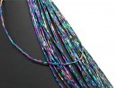 Colourful iridescent, pierced hematite in grey