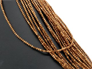 Petites boules dhématite percées et facettées de couleur brune