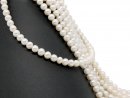 Pierced, white beads for jewellery