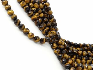 Pierced, golden brown tigers eye beads