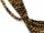 Pierced, golden brown tigers eye beads