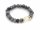Flexible ring with gemstones and silver on a rubber band