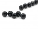 Five faceted pierced onyx beads